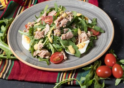 vegetable salad on blue ceramic plate